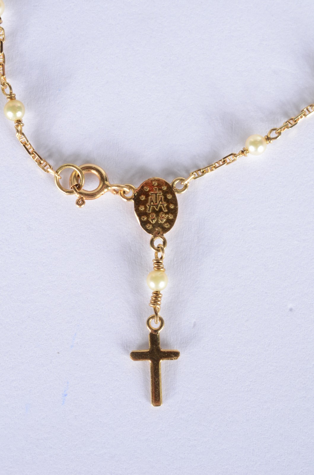 Pulseira de ouro 18 k., contraste 750 mls com perolas e cruz. (Por... - foto 3 de 6