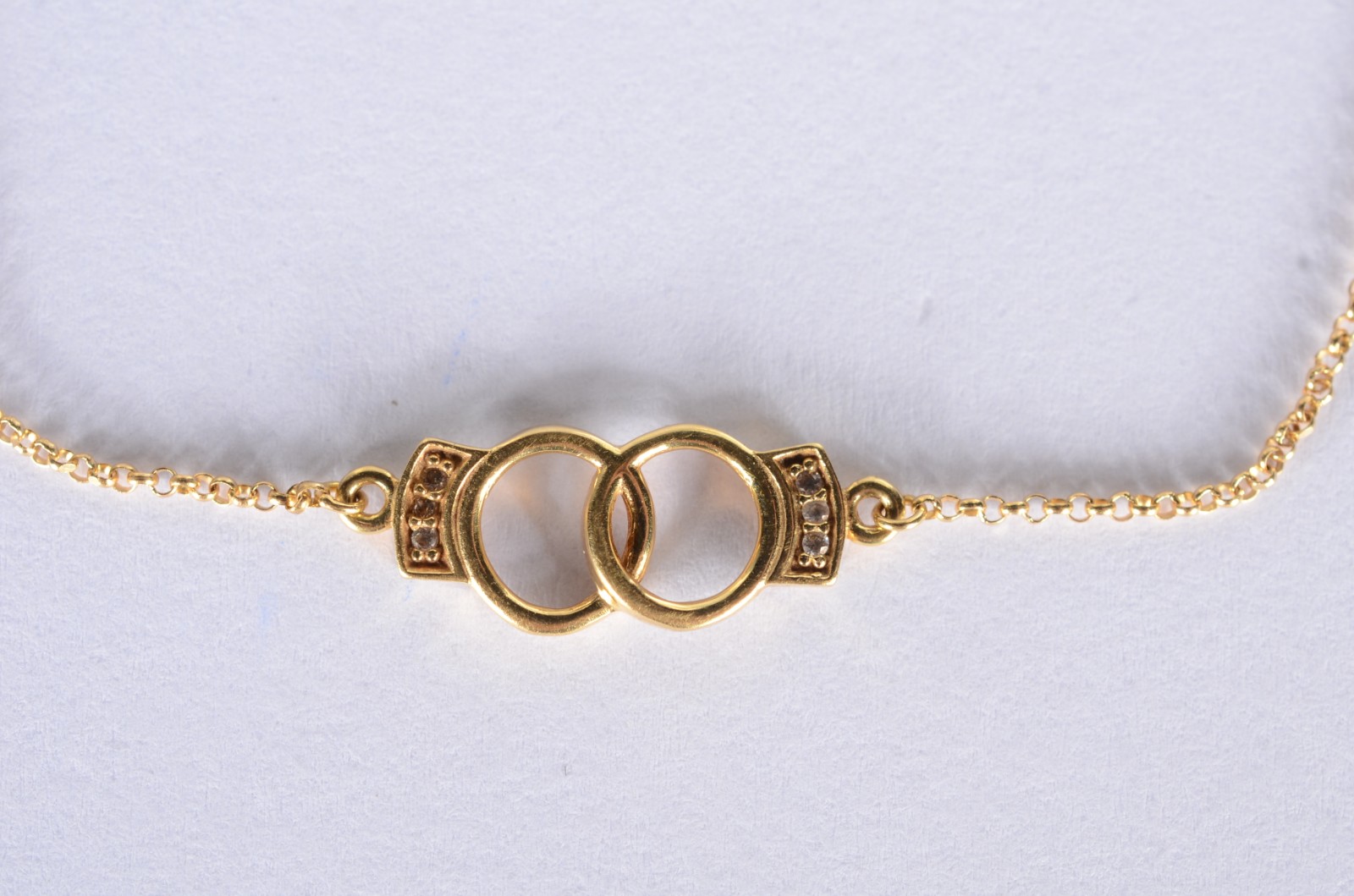 Pulseira de ouro 18 k., feitio "algemas". (Por motivos de segurança a... - foto 1 de 6