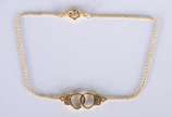 Pulseira de ouro 18 k., feitio "algemas". (Por ... - Pulseira de ouro 18 k., feitio "algemas". (Por motivos de segurança a peça não se encontra na loja).