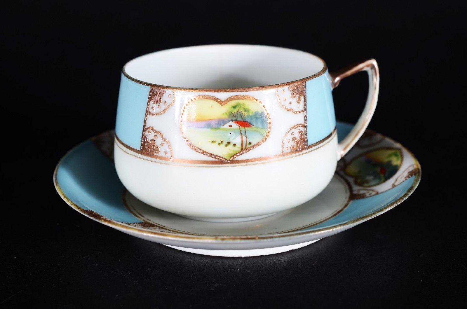 Serviço para café de porcelana oriental, composto de: 2 xícaras de... - foto 6 de 9