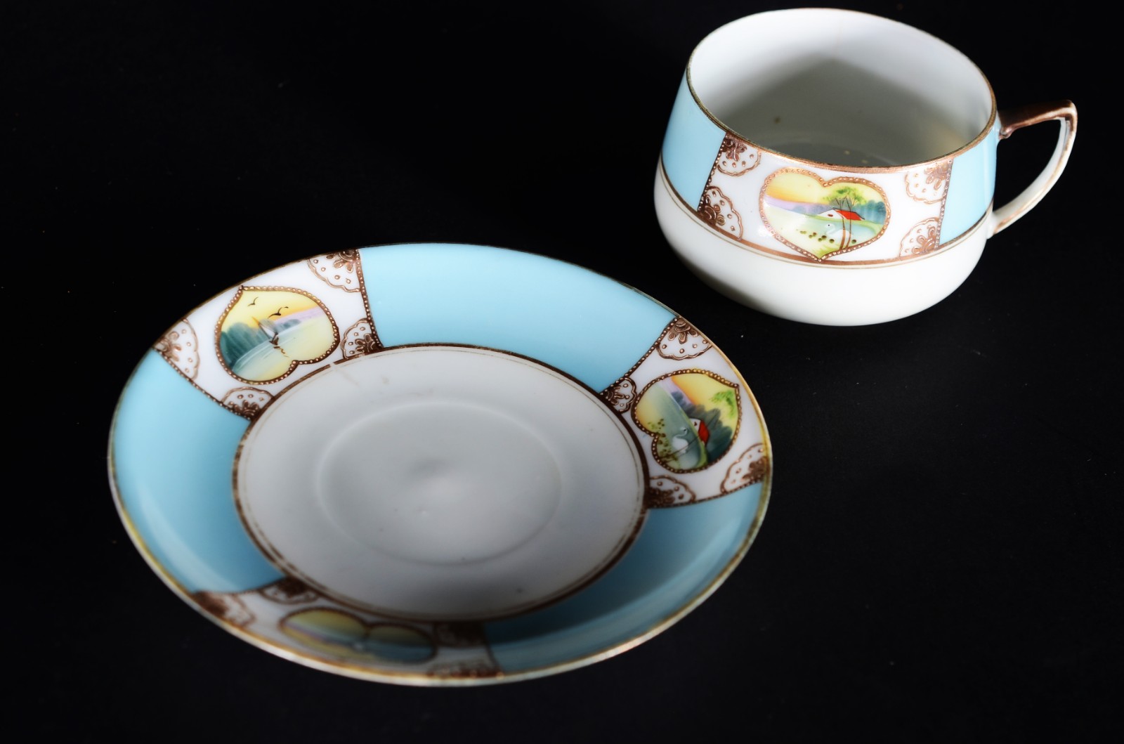 Serviço para café de porcelana oriental, composto de: 2 xícaras de... - foto 7 de 9