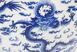Grande cachepot de porcelana chinesa decorada c... - Grande cachepot de porcelana chinesa decorada com figuras de dragão em azul e branco.