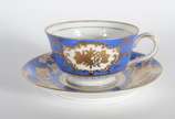 JYOTO,  - Aparelho de jantar de porcelana japonesa "Jyoto", branca com tarja azul turquesa decorada com guirlandas e frisos dourados, composto de: 24 pratos ras