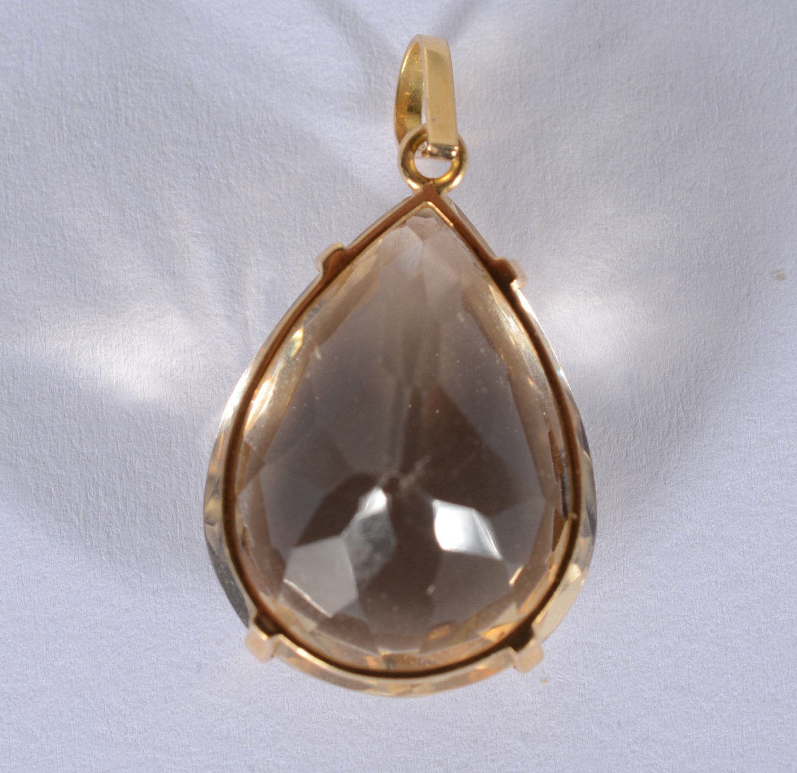 Pendente de ouro 18 k., e pedra topázio. (Por motivos de segurança a... - foto 1 de 4