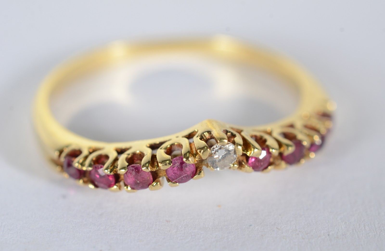 Anel de ouro 18 k., contraste 750 mls com rubilitas e brilhante, aro... - foto 3 de 5