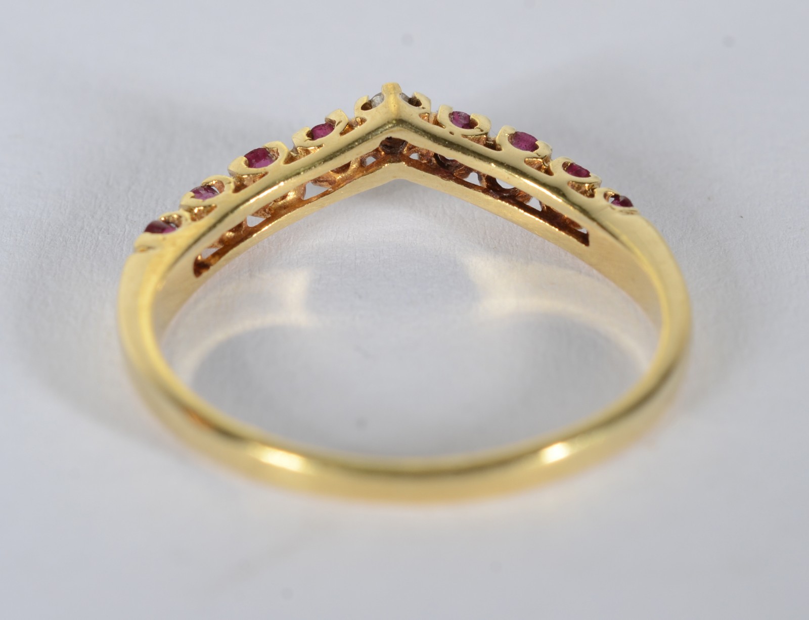 Anel de ouro 18 k., contraste 750 mls com rubilitas e brilhante, aro... - foto 4 de 5