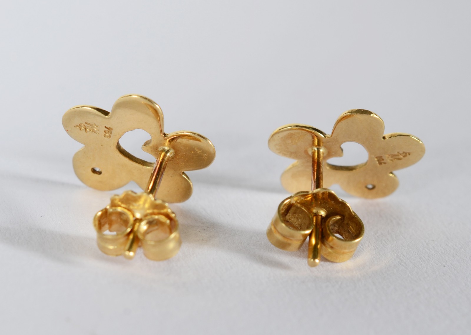 Par de brincos de ouro 18 k., contraste 750 mls feitio flor com dois... - foto 5 de 7