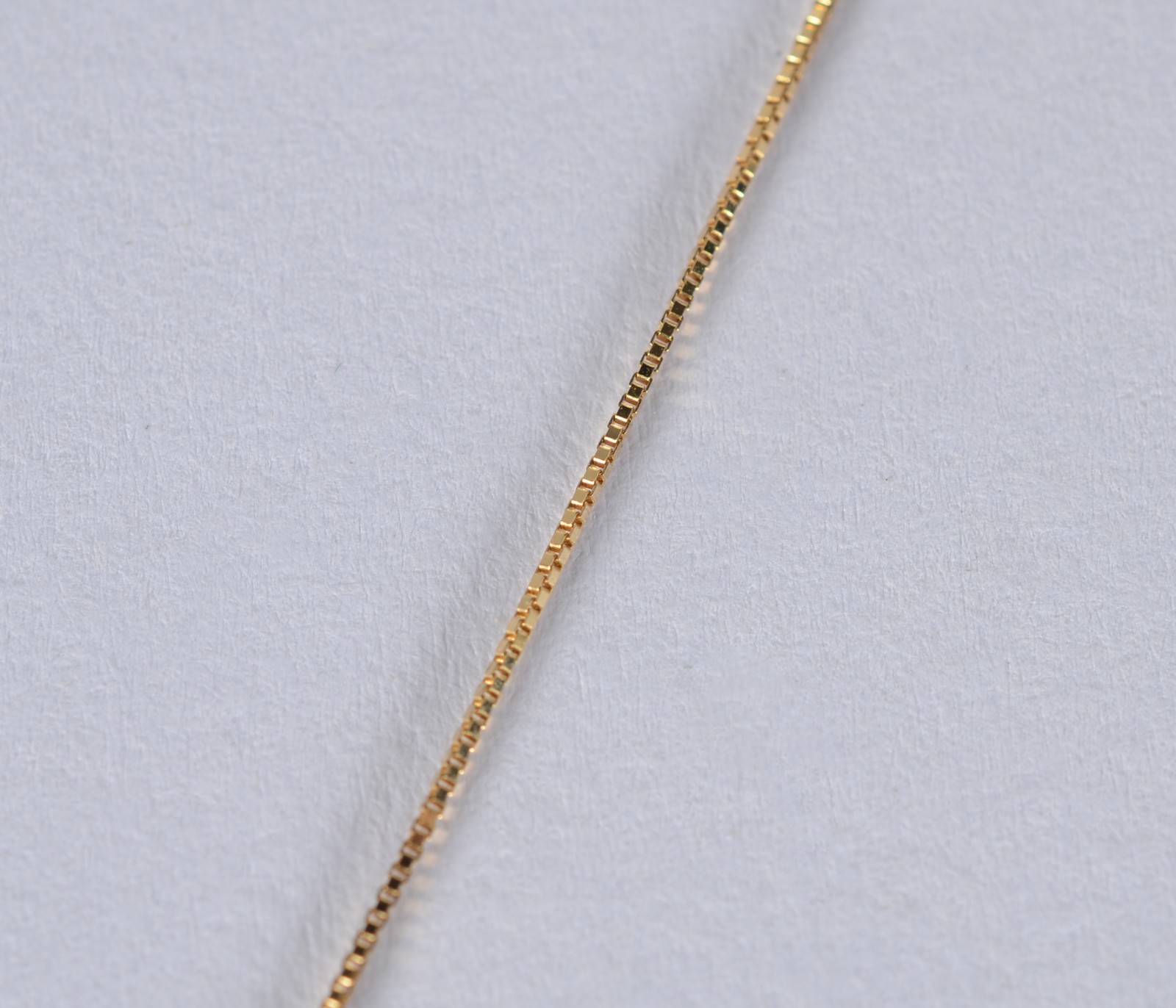 Colar de ouro 18 k., contraste 750 mls com crucifixo de ouro branco e... - foto 4 de 6