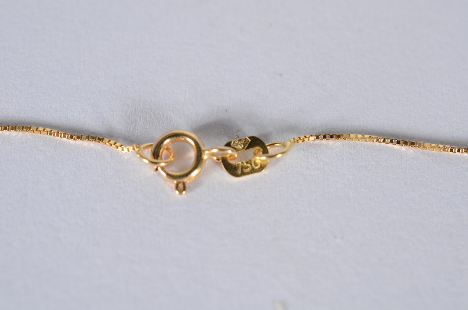 Colar de ouro 18 k., contraste 750 mls com crucifixo de ouro branco e... - foto 5 de 6