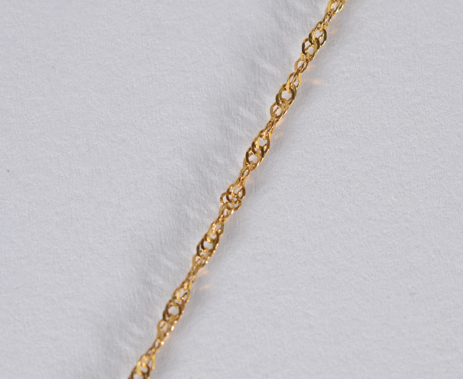 Colar com pendente feitio sol de ouro 18 k., contraste 750 mls. (Por... - foto 3 de 5