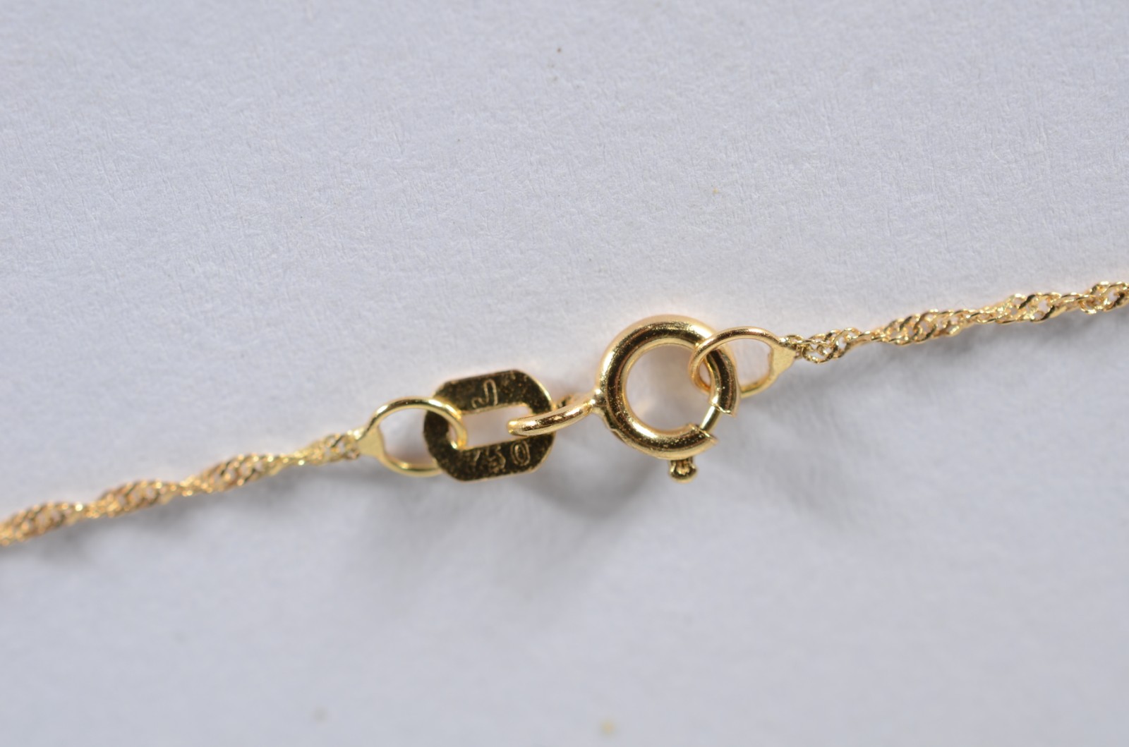 Colar com pendente feitio cruz de ouro 18 k., contraste 750 mls. (Por... - foto 5 de 7