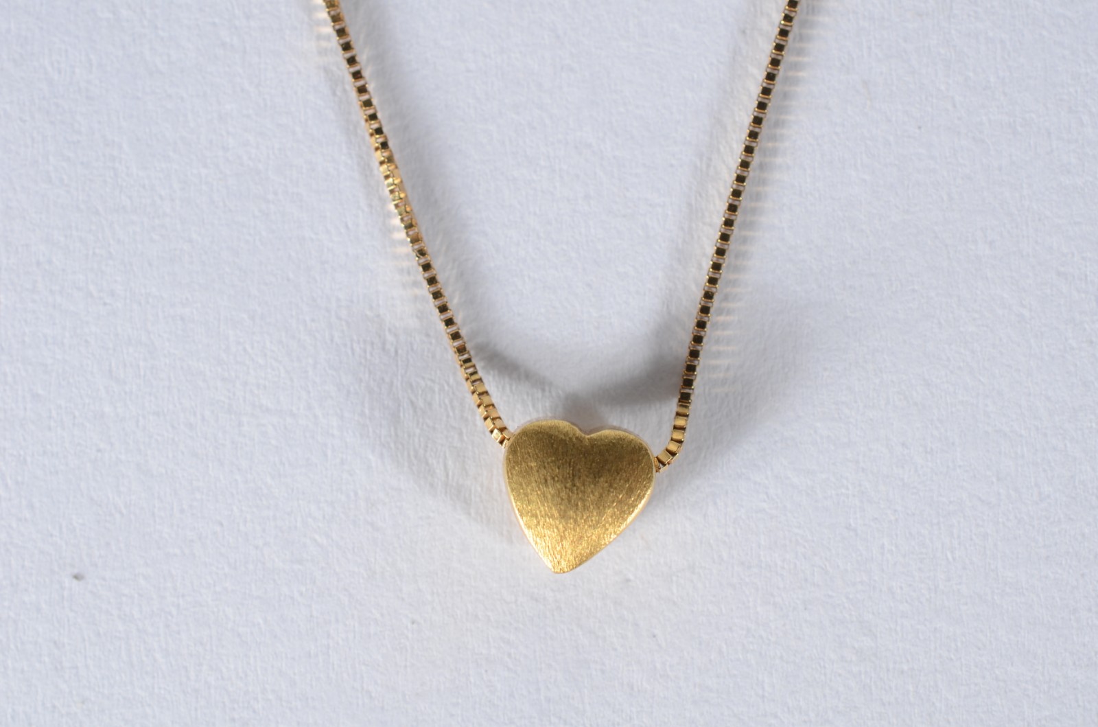 Colar com pendente de ouro 18 k., contraste 750 mls. (Por motivos de... - foto 1 de 5