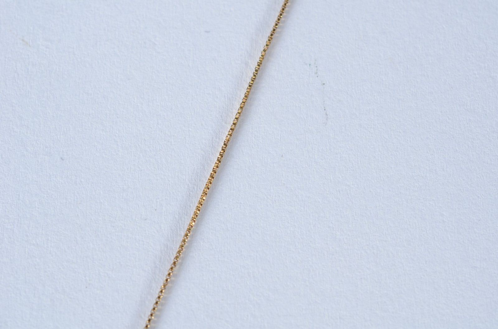 Colar com pendente na forma de cruz de ouro 18 k., contraste 750 mls... - foto 3 de 6