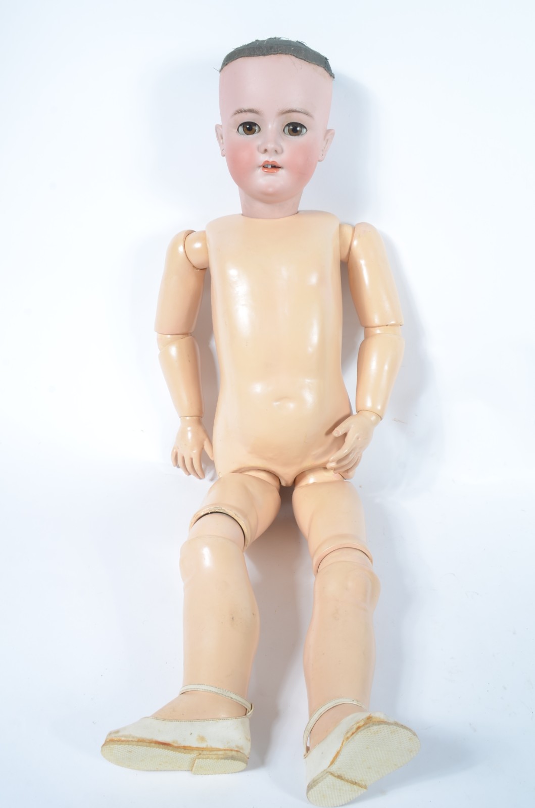 Antiga boneca alemã com cabeça de biscuit e corpo de massa, braços e... - foto 7 de 10