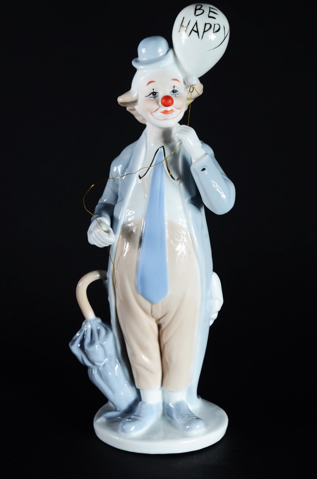 Estatueta de porcelana policromada representando palhaço. - foto 1 de 7