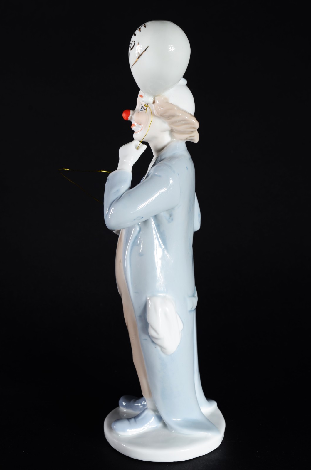Estatueta de porcelana policromada representando palhaço. - foto 3 de 7