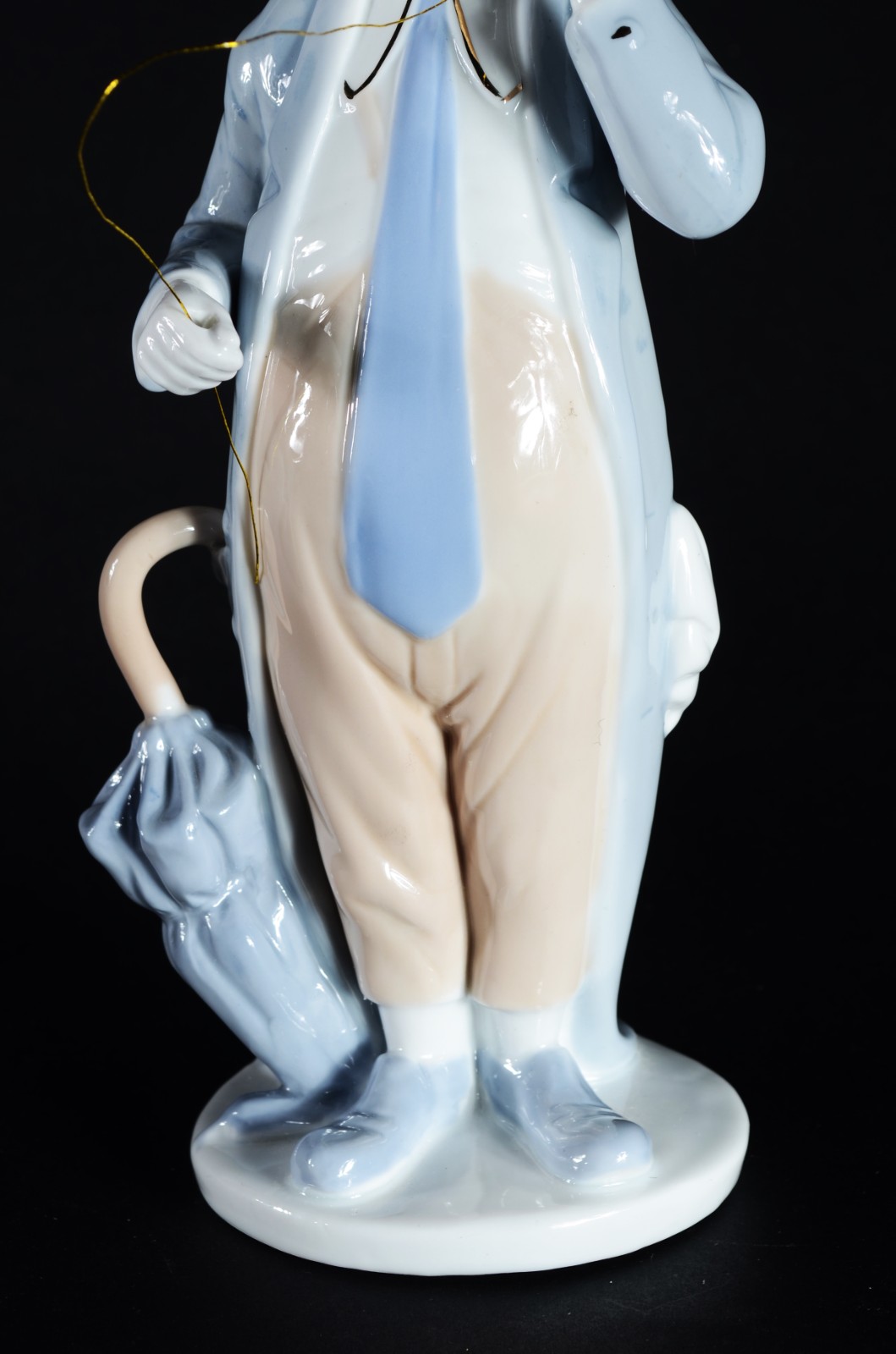 Estatueta de porcelana policromada representando palhaço. - foto 5 de 7