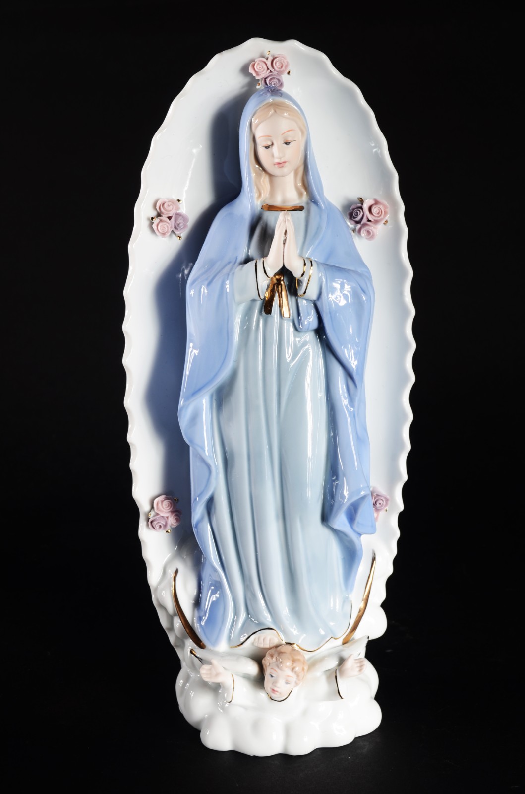 Estatueta de porcelana policromada representando Nossa Senhora com... - foto 1 de 7