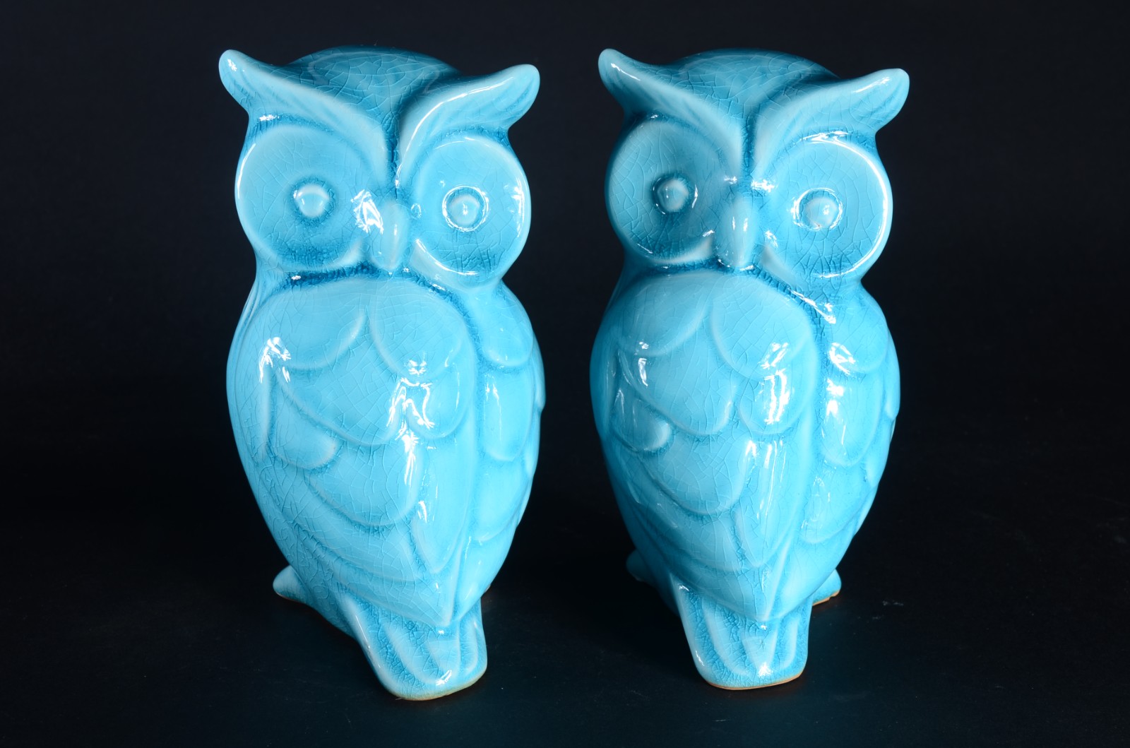 Par de estatuetas de cerâmica vitrificada azul turquesa representando... - foto 1 de 7
