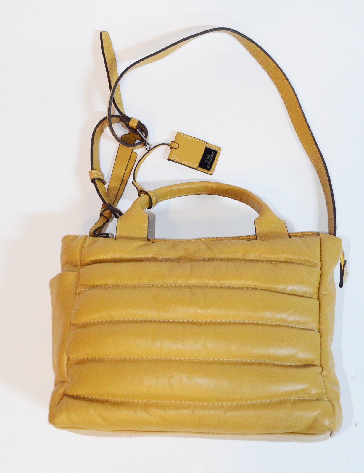Bolsa feminina na cor mostarda da marca Elisa Atheniense. - foto 1 de 5