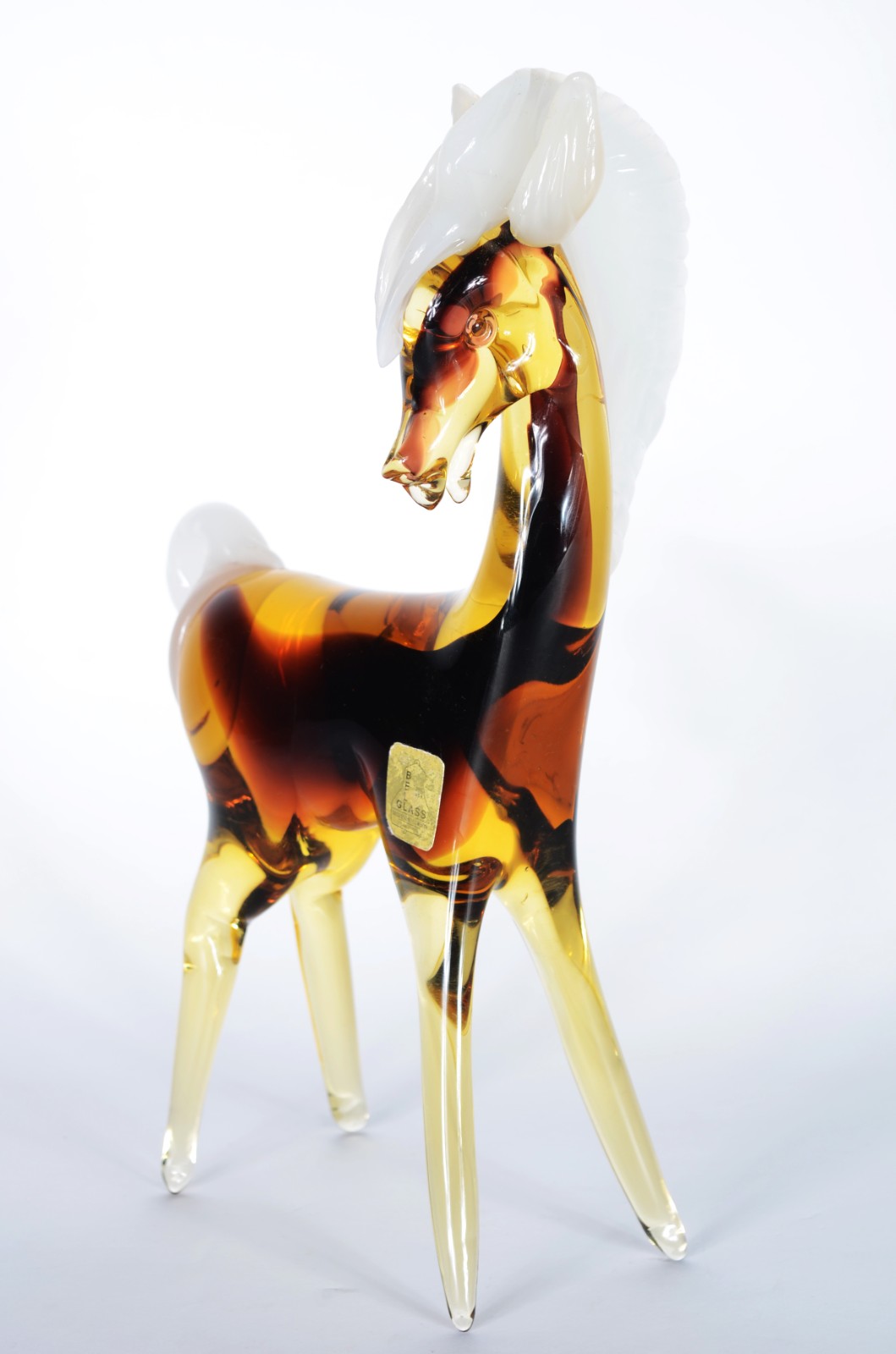 Escultura de murano italiano na cor âmbar representando cavalo. Cauda... - foto 1 de 8