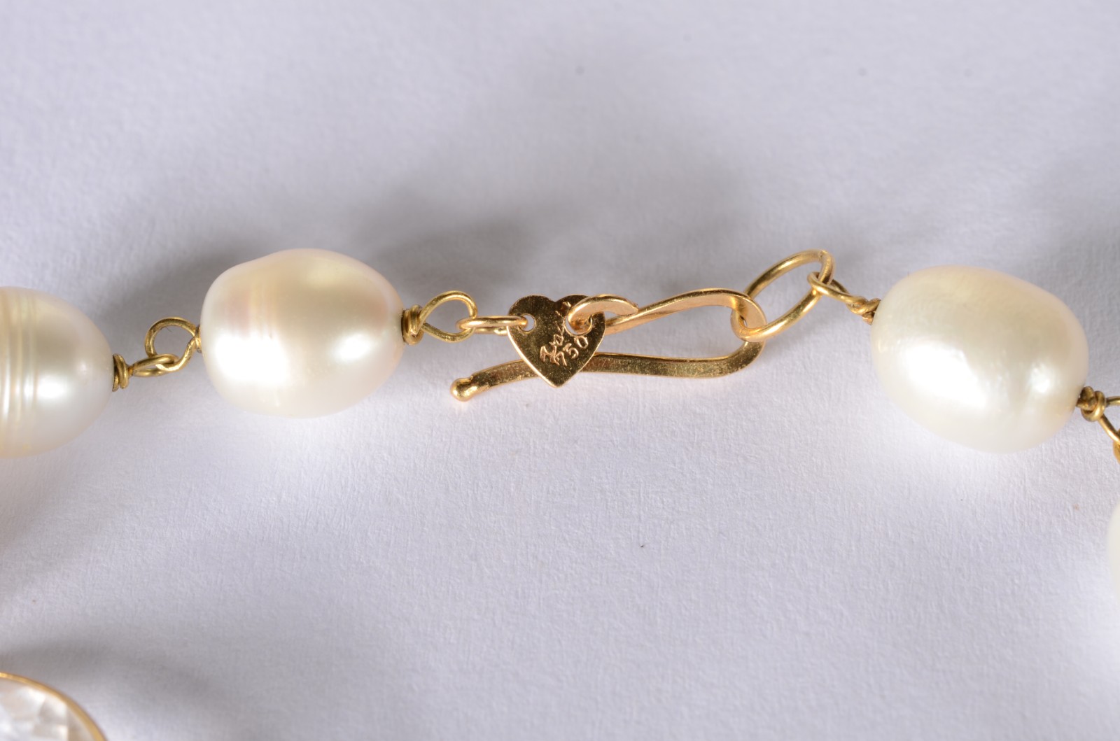 Pulseira de ouro 18 k., com cristais e perolas. (Por motivos de... - foto 4 de 6