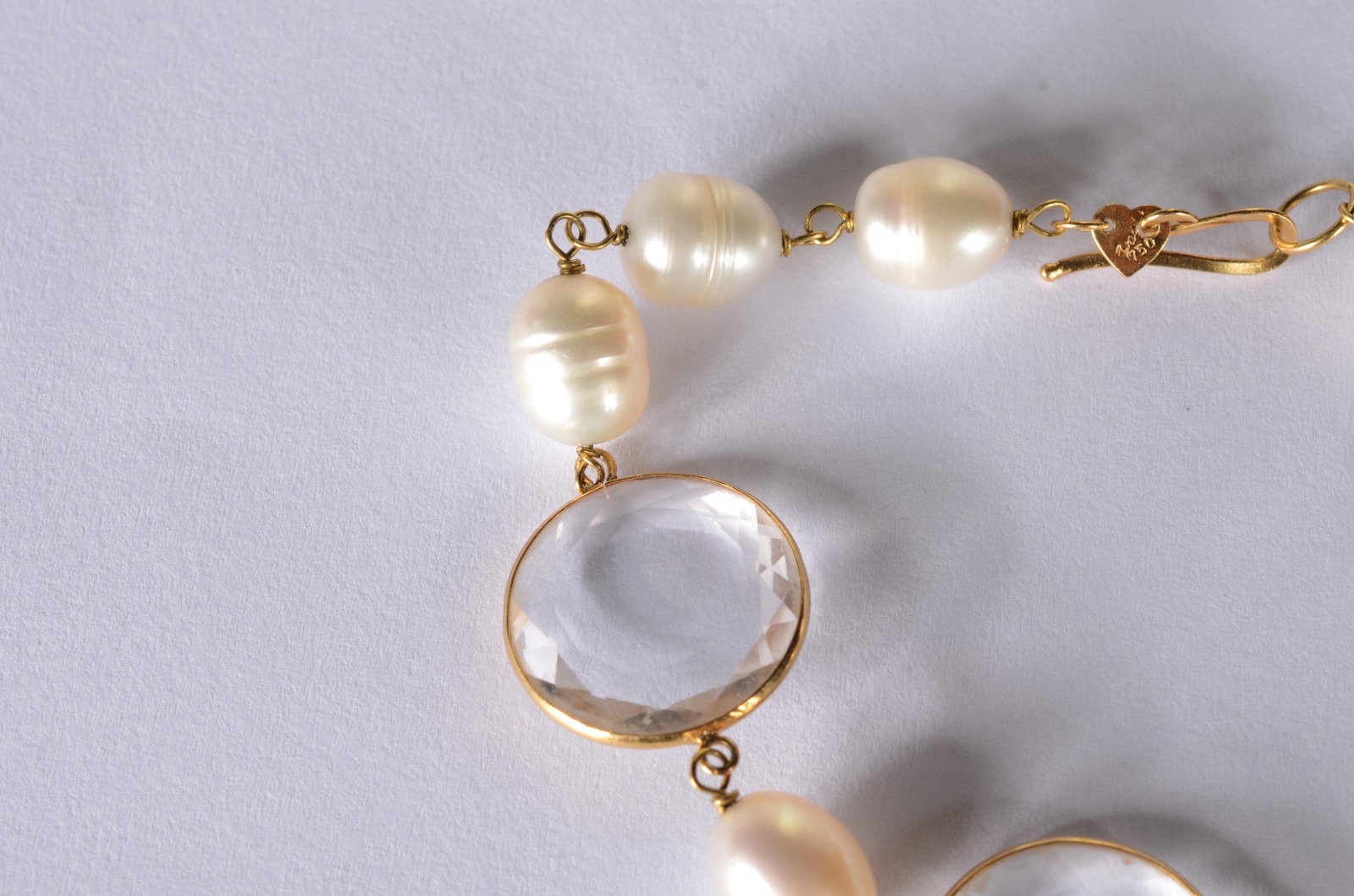 Pulseira de ouro 18 k., com cristais e perolas. (Por motivos de... - foto 5 de 6