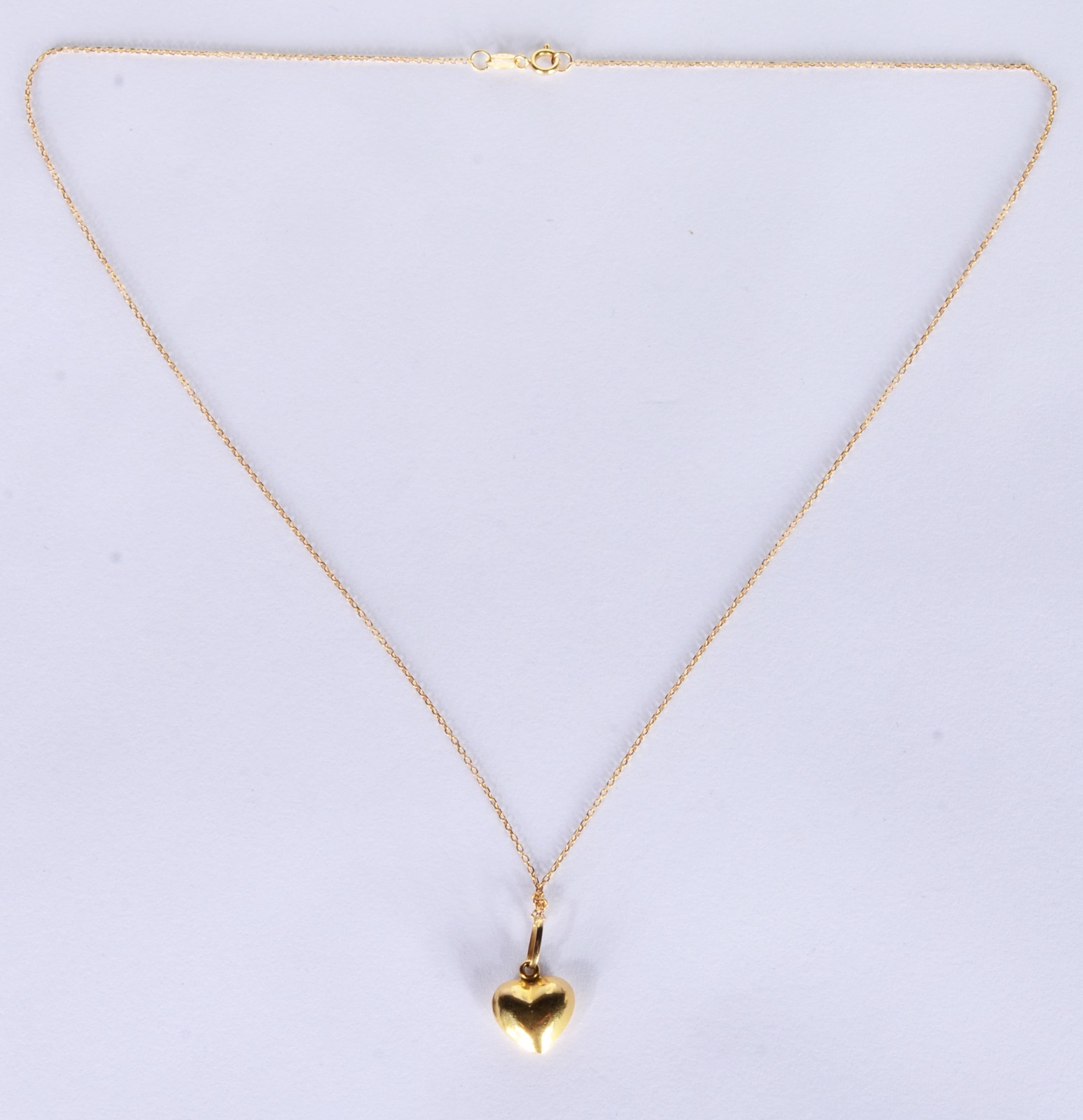 Colar com pendente feitio coação de ouro 18 k., contraste 750 mls... - foto 2 de 4