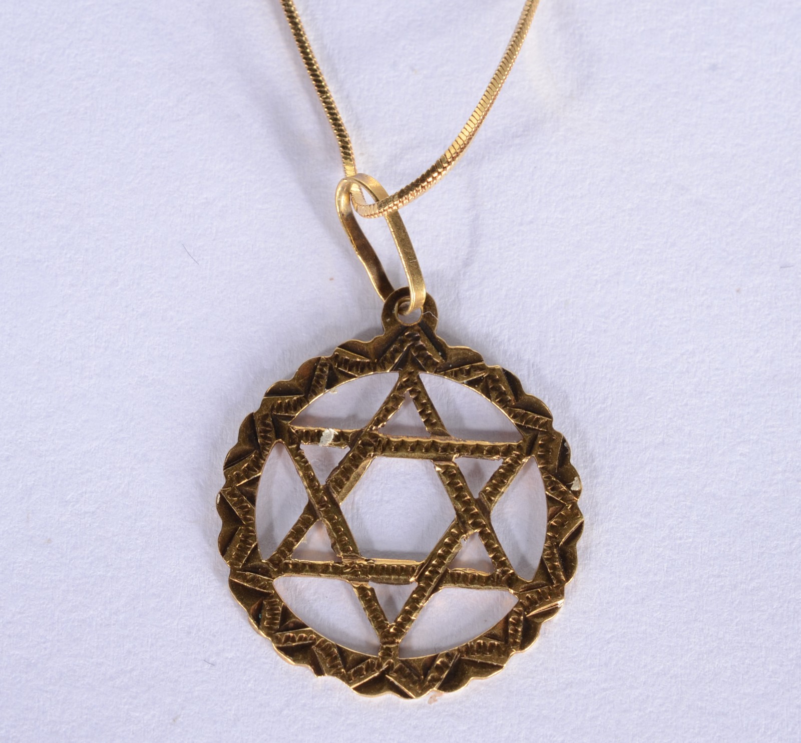 Colar com pendente "estrela de Davi" de ouro 18 k., contraste 750... - foto 1 de 5