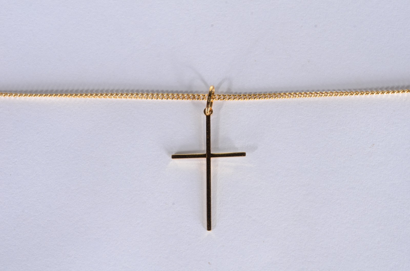 Colar com pendente feitio cruz de ouro 18 k., contraste 750 mls. (Por... - foto 1 de 7