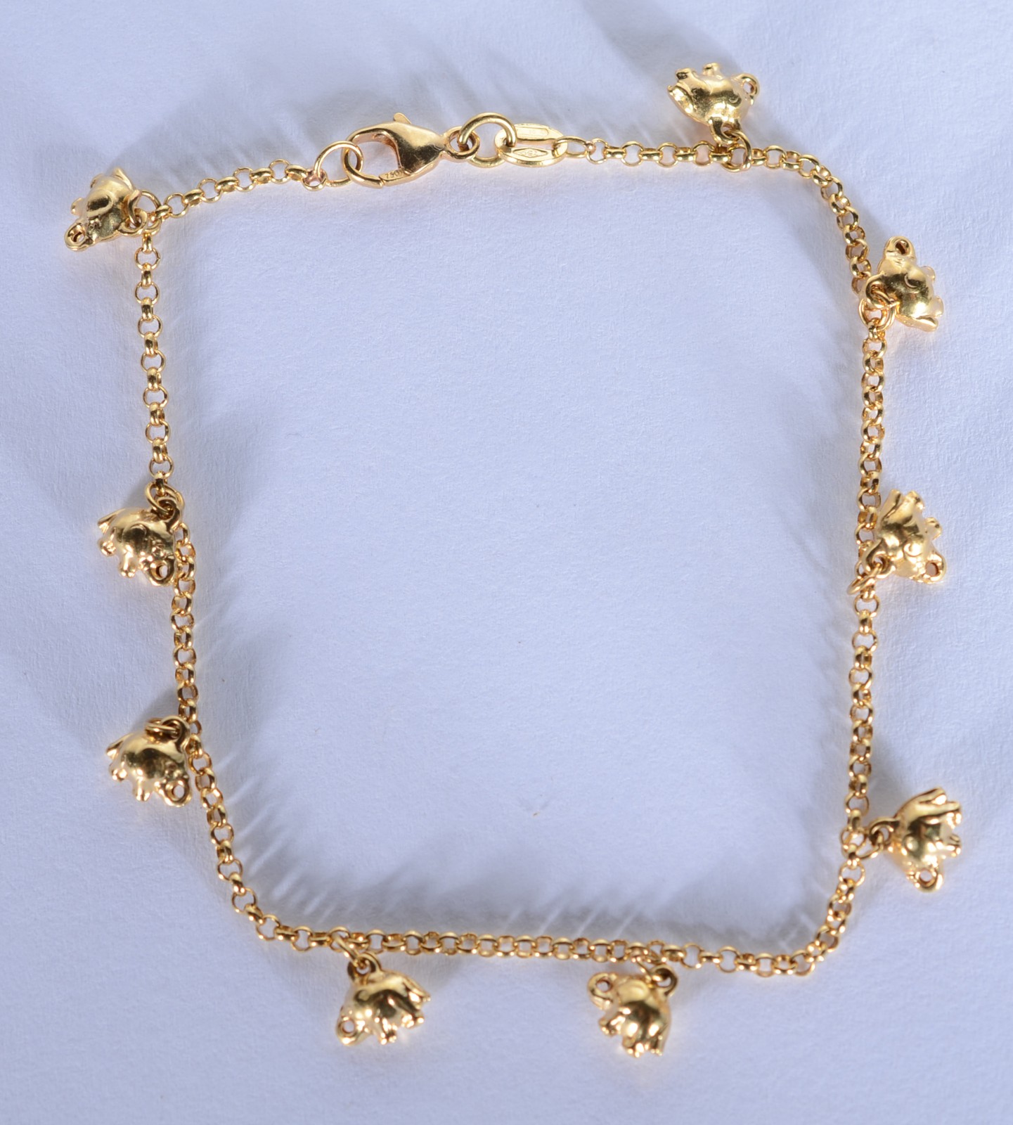 Pulseira com pendente feitio elefantes de ouro 18 k., contraste 750... - foto 1 de 7