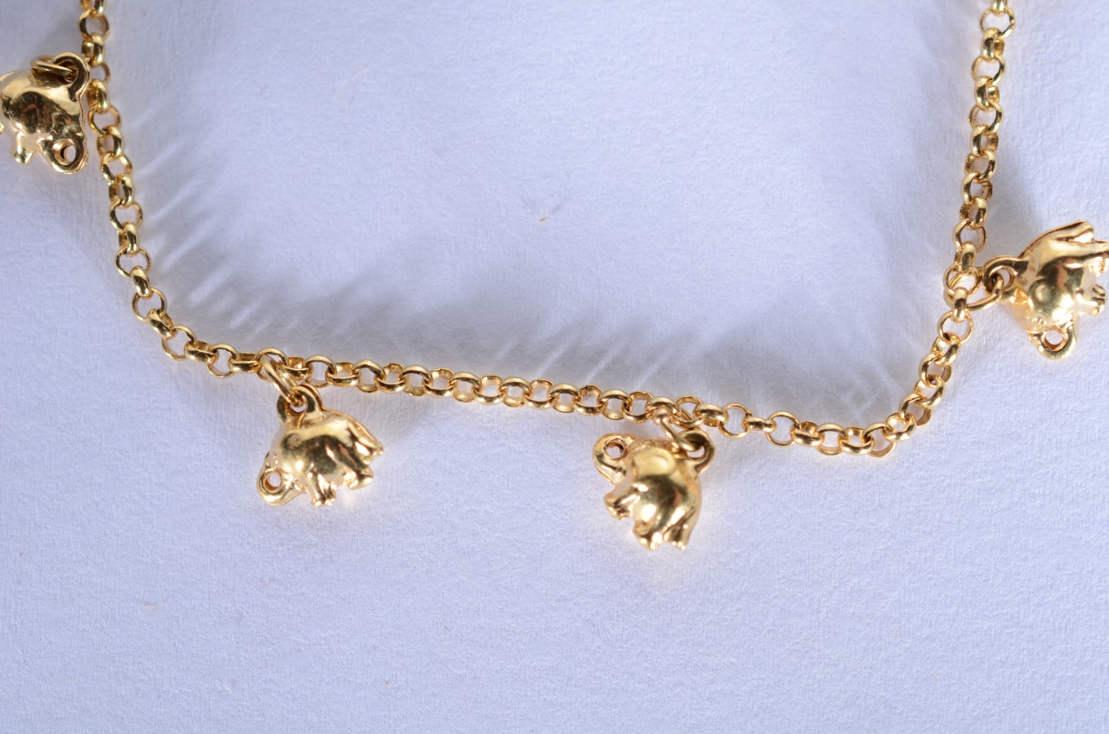 Pulseira com pendente feitio elefantes de ouro 18 k., contraste 750... - foto 2 de 7