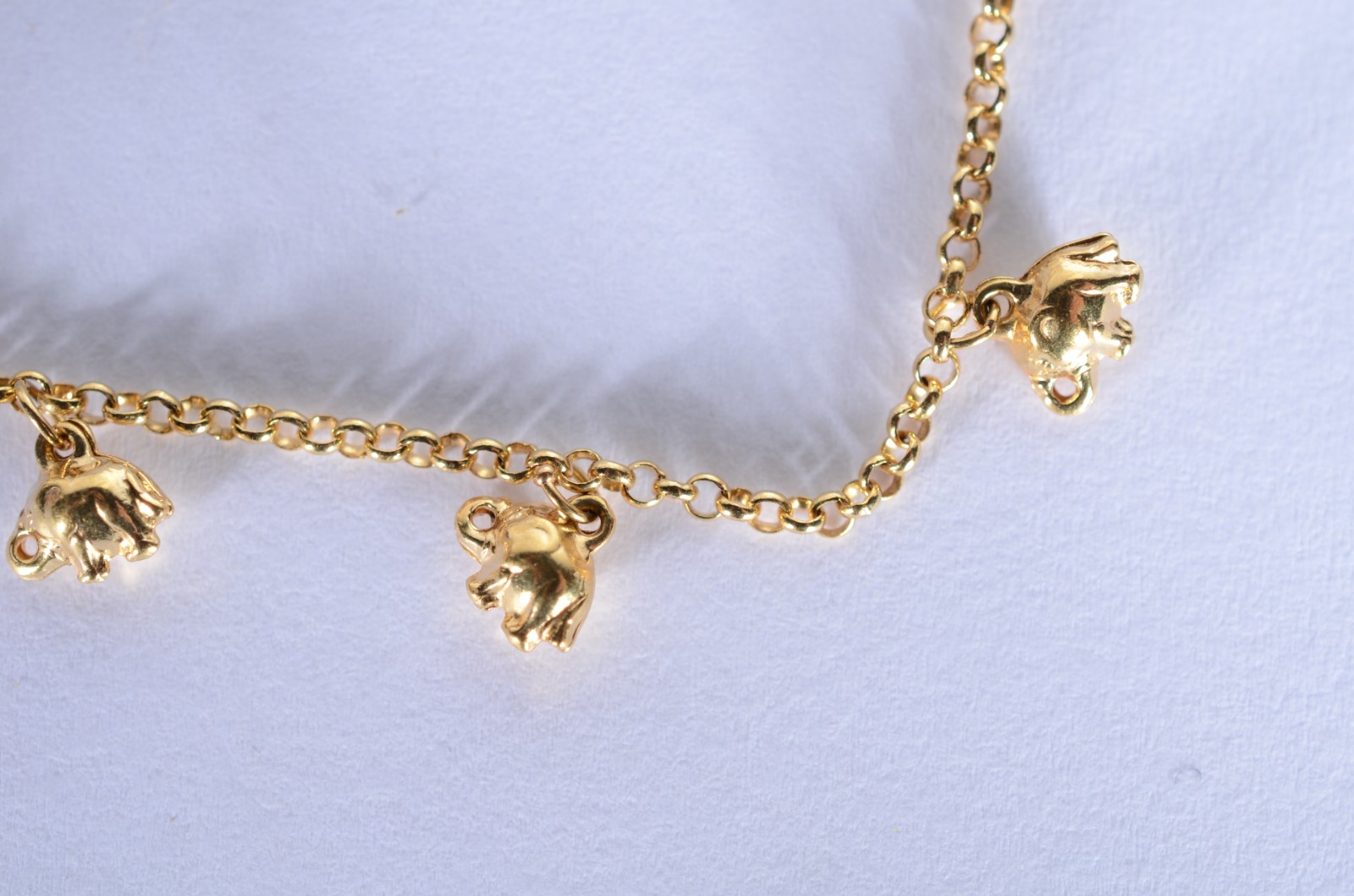 Pulseira com pendente feitio elefantes de ouro 18 k., contraste 750... - foto 3 de 7
