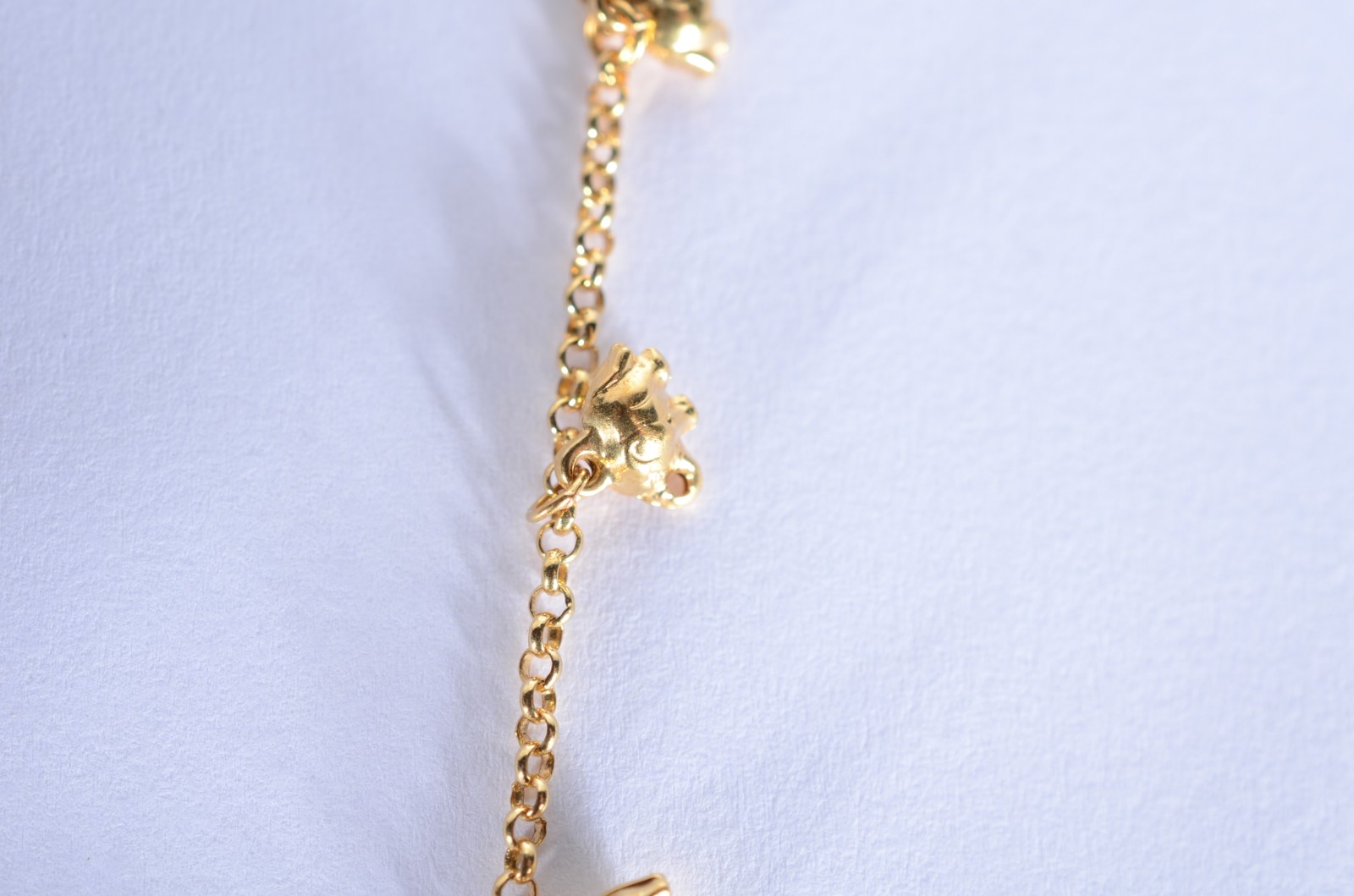 Pulseira com pendente feitio elefantes de ouro 18 k., contraste 750... - foto 6 de 7