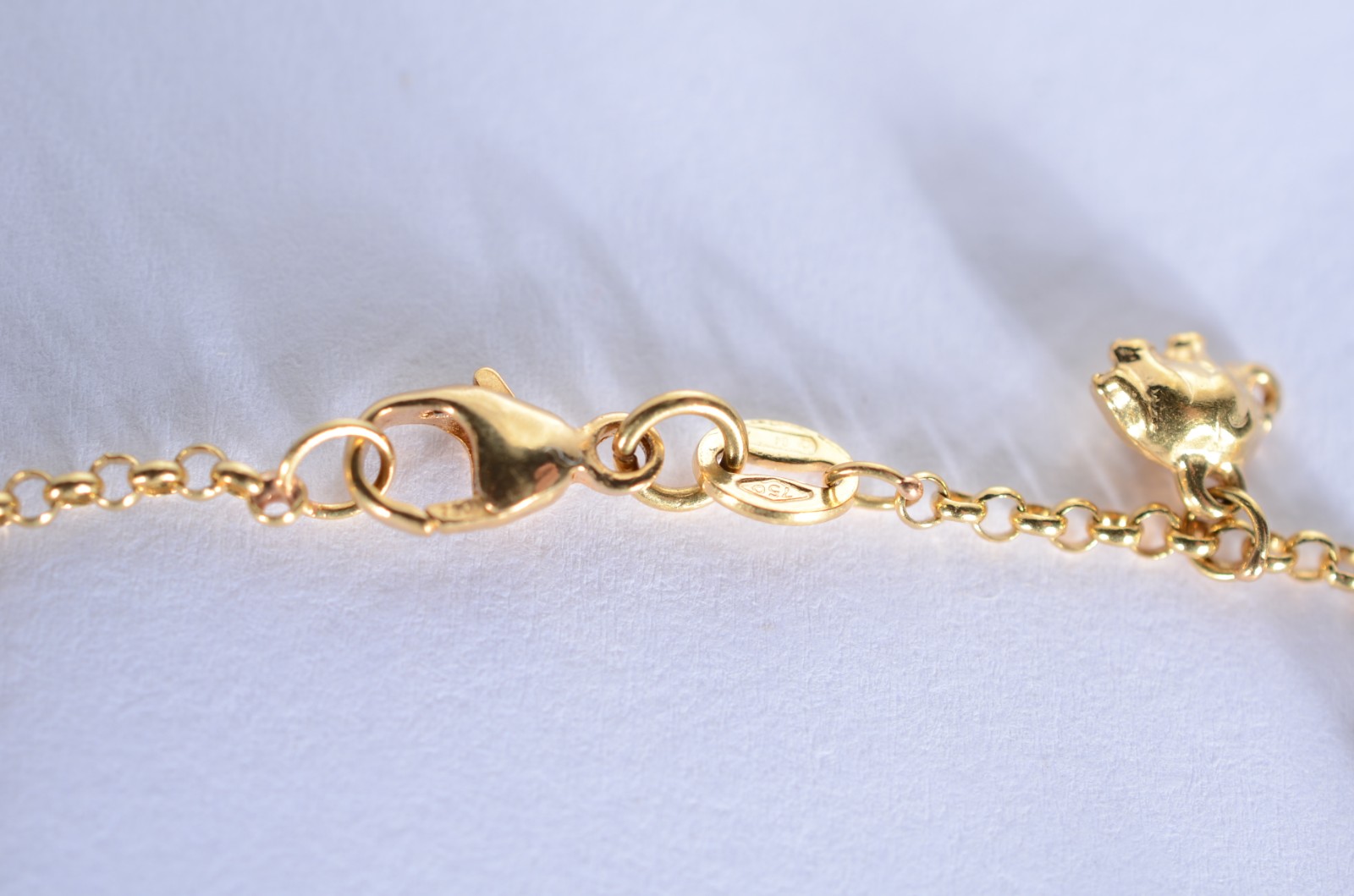 Pulseira com pendente feitio elefantes de ouro 18 k., contraste 750... - foto 7 de 7