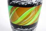 Vaso de vidro decorativo em mesclas nas cores v... - Vaso de vidro decorativo em mesclas nas cores verde, âmbar, preto e branco.