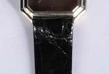 Baume & Mercier (1830),  - Relógio de pulso com mostrador de ouro branco, no estojo. Máquina parada. Media do mostrador: 20 mm.