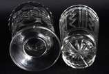 Três peças de cristal lapidado, sendo: 2 vasos ... - Três peças de cristal lapidado, sendo: 2 vasos e bowl (bicados na borda).