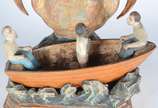 Nossa Senhora da Caridade do Cobre - Nossa Senhora da Caridade do Cobre - Imagem de madeira policromada, com resplendor. Parte inferior apresentado barco com tres figuras, faltando partes