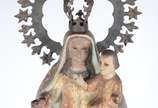 Nossa Senhora da Caridade do Cobre - Nossa Senhora da Caridade do Cobre - Imagem de madeira policromada, com resplendor. Parte inferior apresentado barco com tres figuras, faltando partes