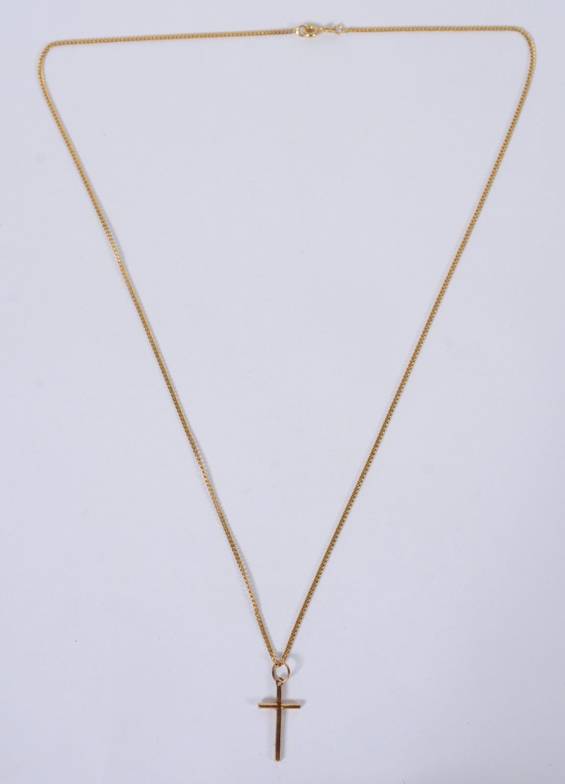 Colar com crucifixo de ouro 18 k., contraste 750 mls. (Por motivos de... - foto 1 de 5