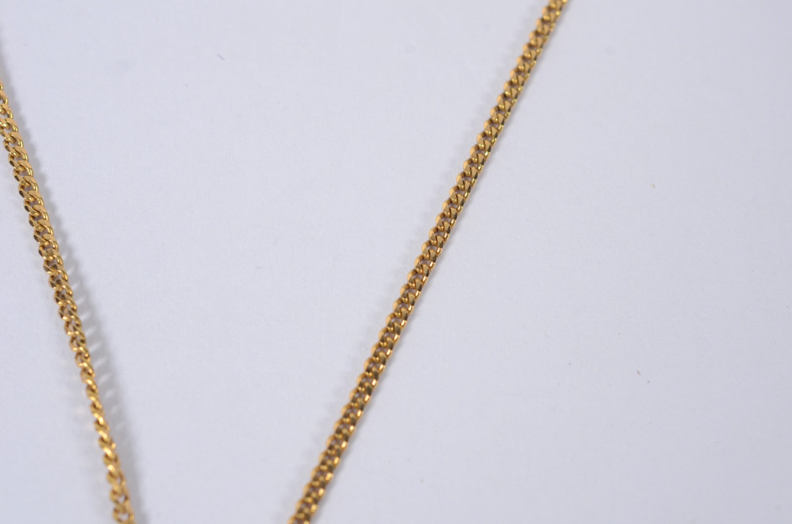 Colar com crucifixo de ouro 18 k., contraste 750 mls. (Por motivos de... - foto 4 de 5
