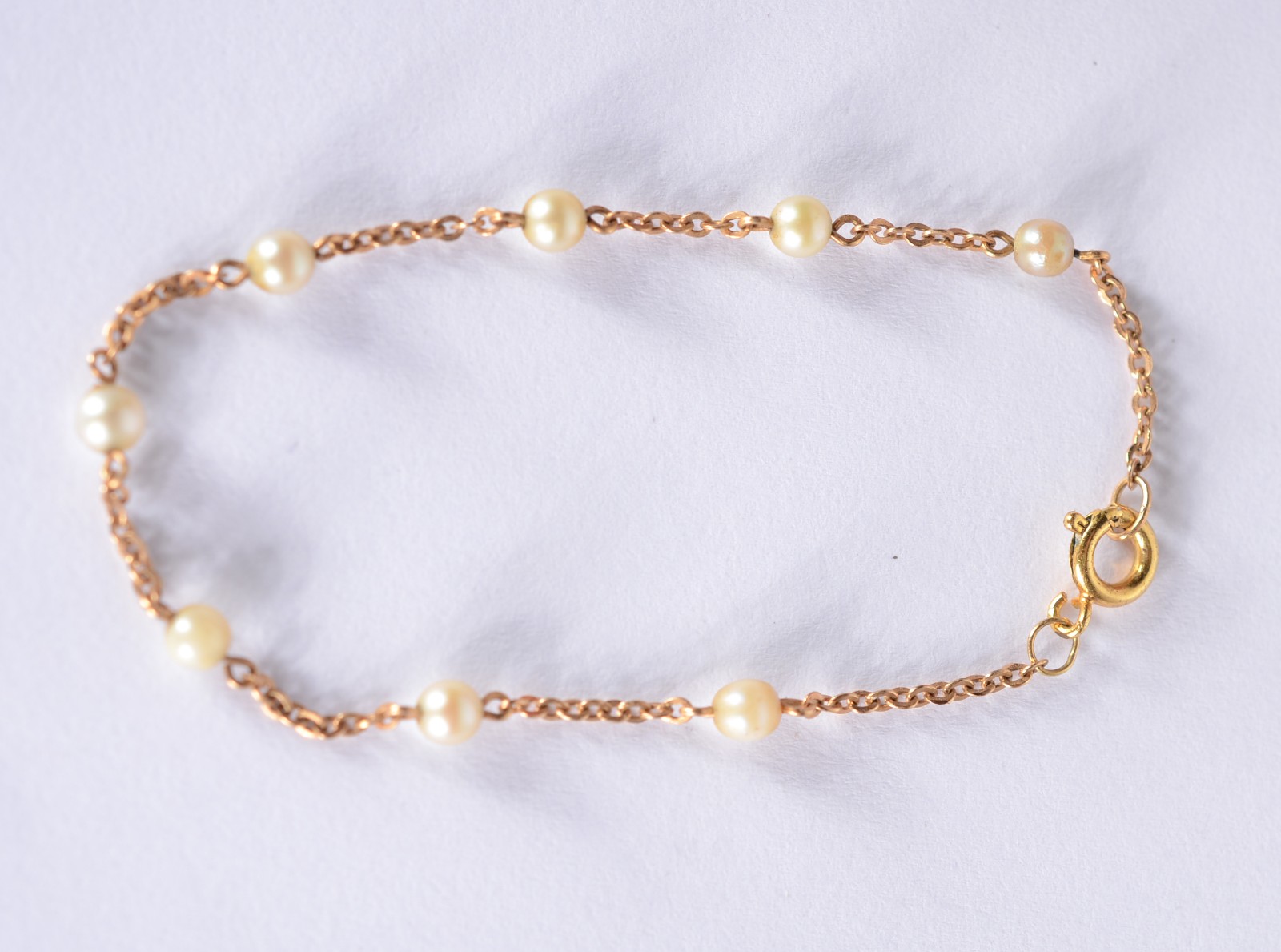 Pulseira de criança de ouro 18 k., contraste 750 mls com perolas... - foto 2 de 3