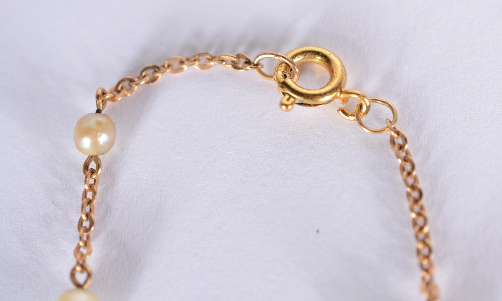 Pulseira de criança de ouro 18 k., contraste 750 mls com perolas... - foto 3 de 3