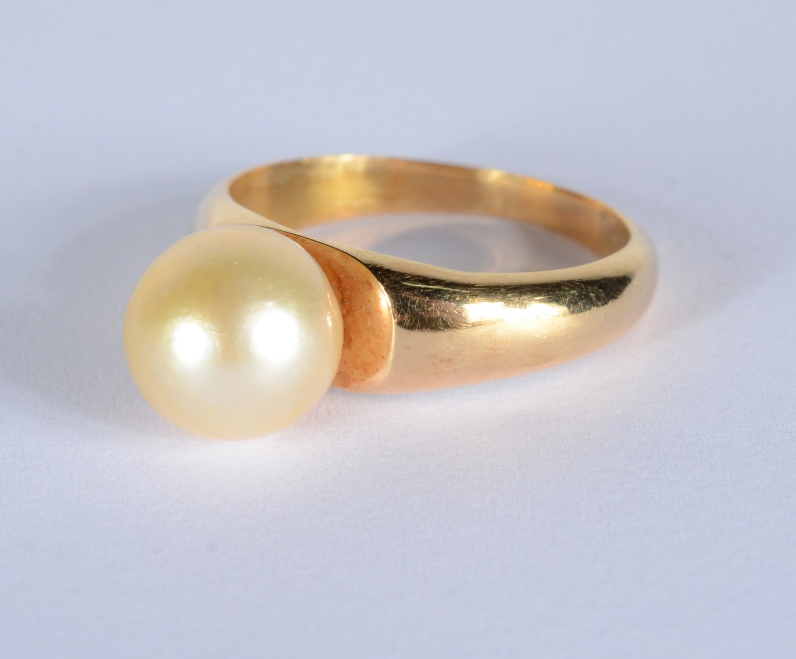 Anel de ouro 18 k., contraste 750 mls com perola, aro 18. (Por... - foto 1 de 5