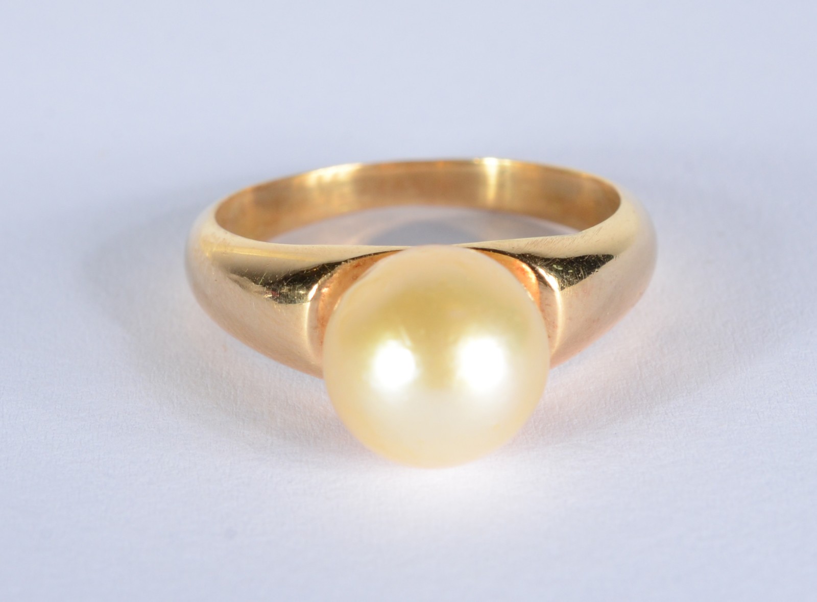 Anel de ouro 18 k., contraste 750 mls com perola, aro 18. (Por... - foto 2 de 5