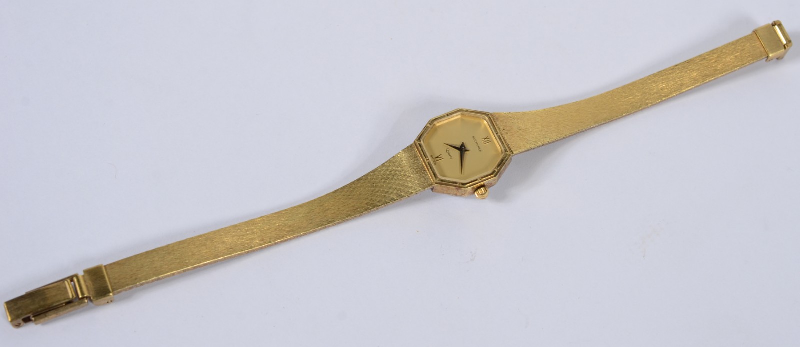 Relógio de pulso de metal dourado, á quartz. Precisando colocar... - foto 3 de 6