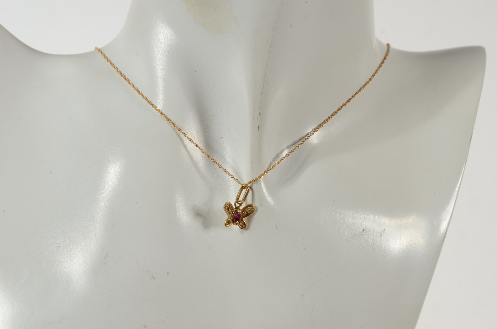 Colar com pendente feitio "borboleta" de ouro 18 k., contraste 750... - foto 7 de 7