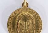 Pendente de ouro 18 k., com rosto de Cristo, co... - Pendente de ouro 18 k., com rosto de Cristo, contraste 750 mls. (Por motivos de segurança a peça não se encontra na loja).