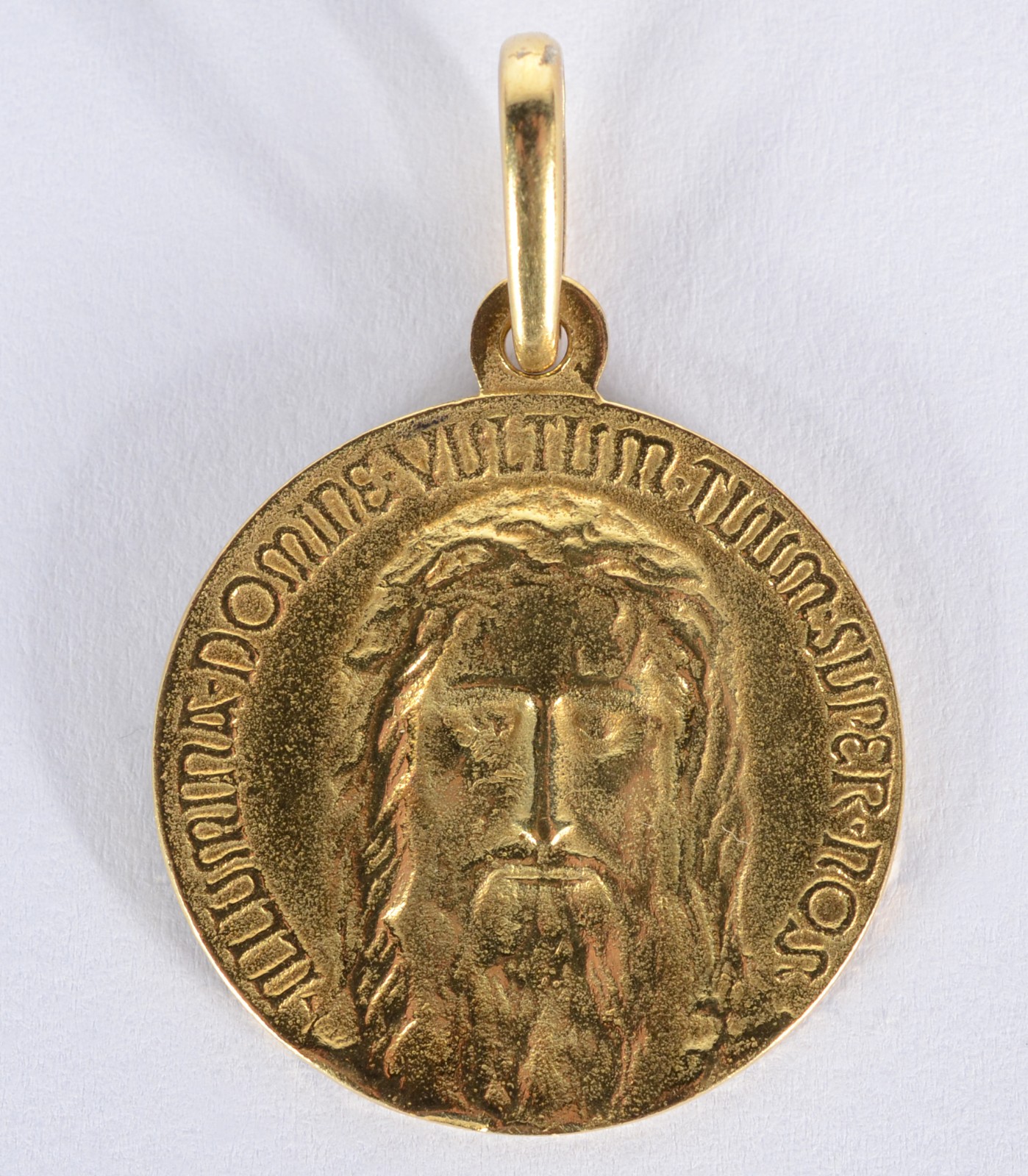 Pendente de ouro 18 k., com rosto de Cristo, contraste 750 mls. (Por... - foto 1 de 3